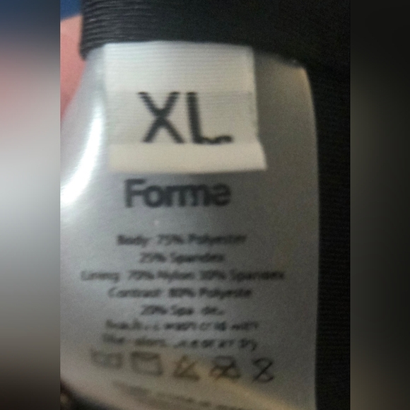 never worn creme & black with cutout in back, revive XL FORME sports bra. - Picture 3 of 3